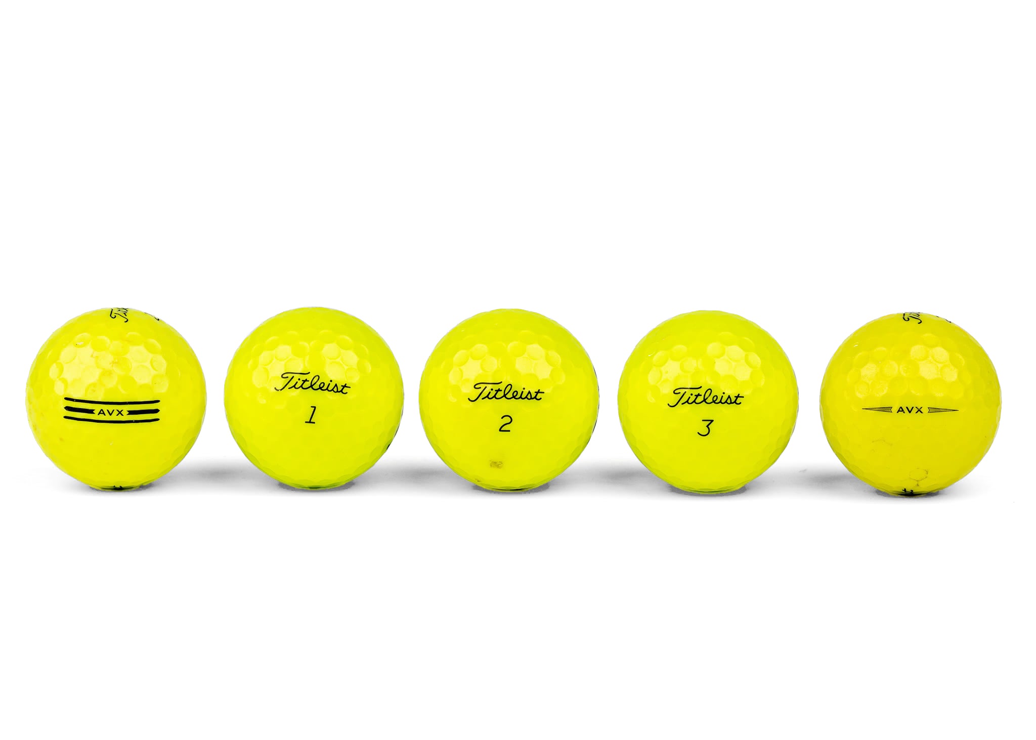 Gekleurde golfballen (roze, oranje, geel)