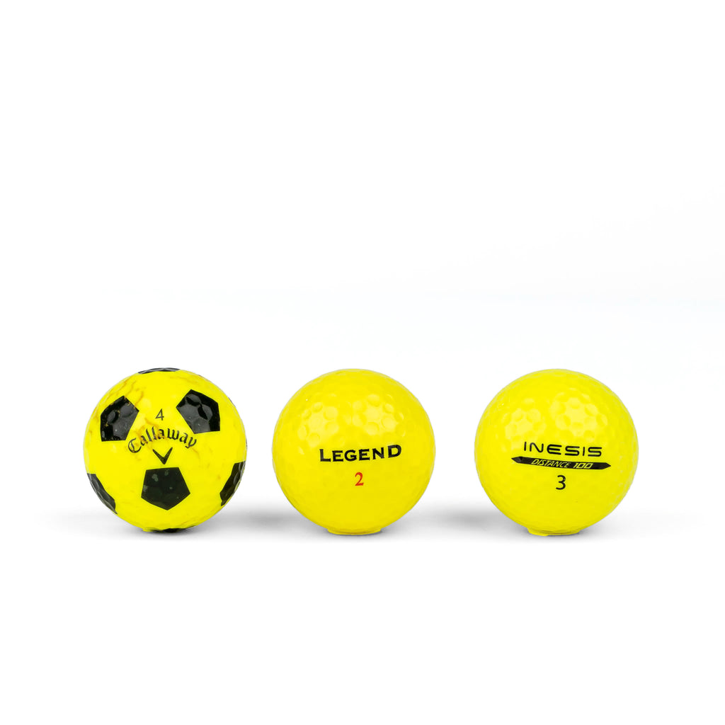 Gekleurde golfballen (roze, oranje, geel)