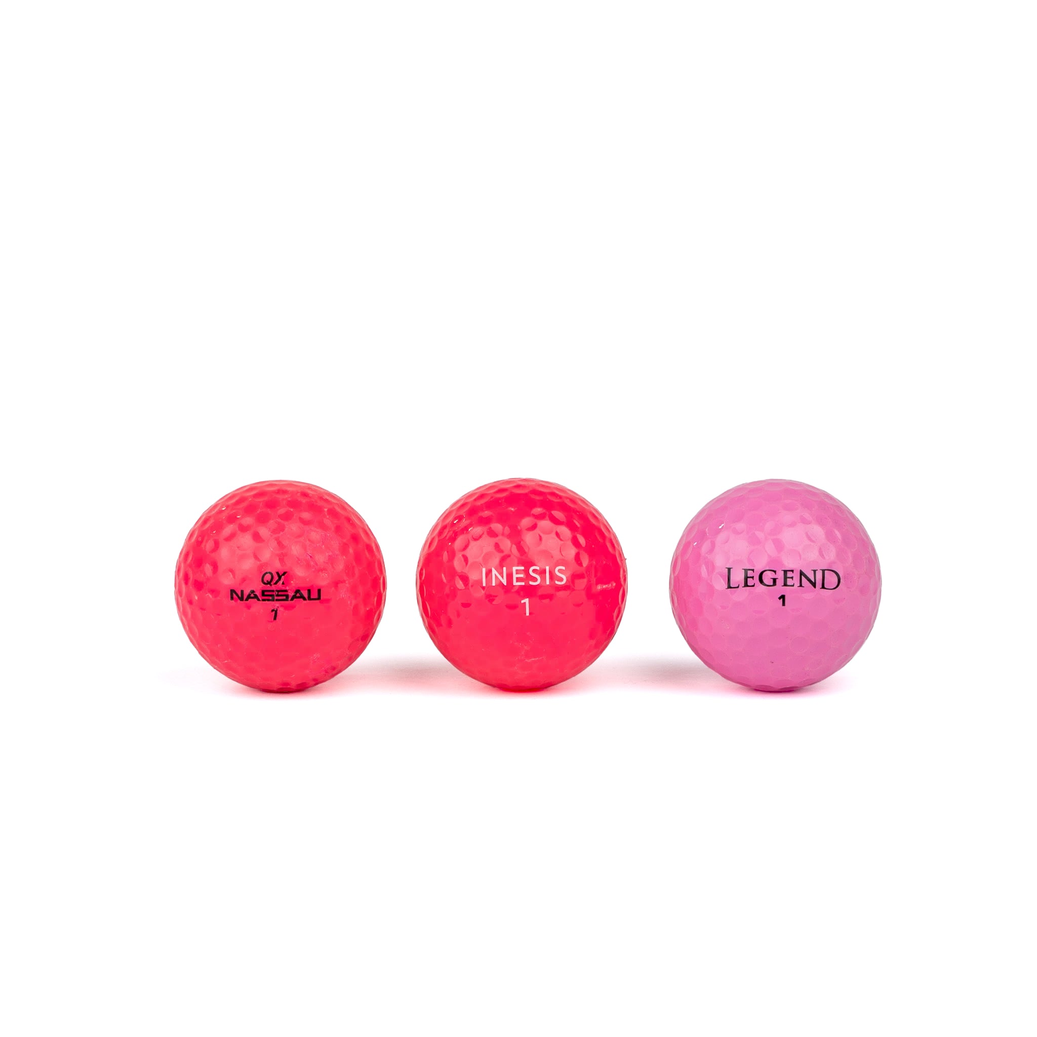 Gekleurde golfballen (roze, oranje, geel)