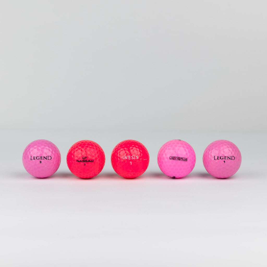Gekleurde golfballen (roze, oranje, geel)
