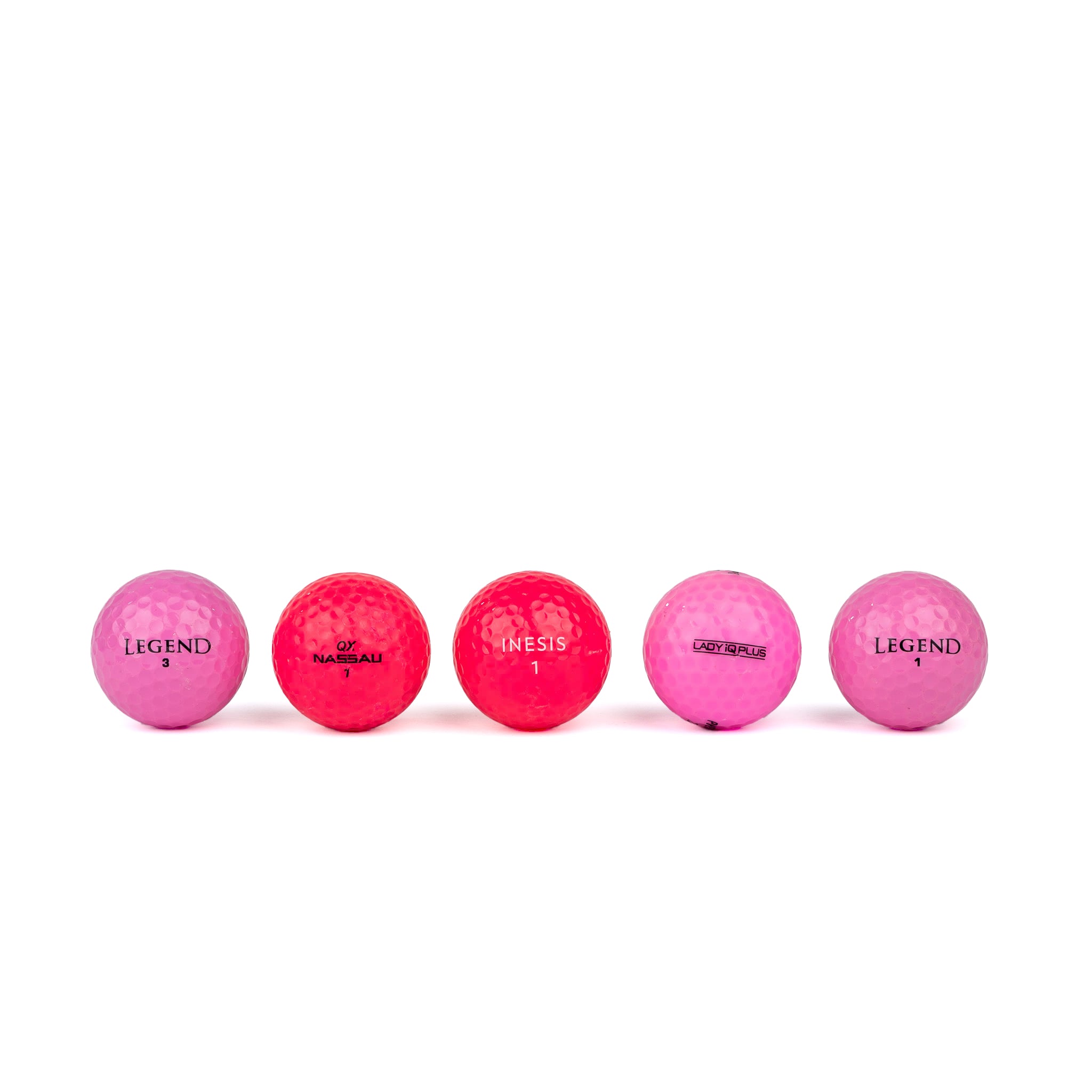 Gekleurde golfballen (roze, oranje, geel)